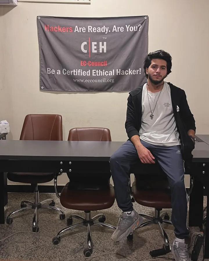 Ahmed in a training room under an EC-Council CEH banner